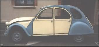 blue and white patrol 2CV, side