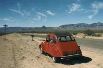 Approaching Kingman, street signs in the Middle of nowhere.